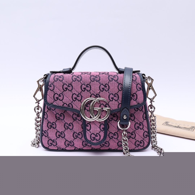 G*u*i top handle bags